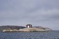House on rock in archipelago Royalty Free Stock Photo