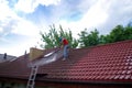 House roof cleaning with pressure tool Royalty Free Stock Photo