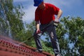 House roof cleaning with pressure tool Royalty Free Stock Photo