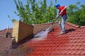 House roof cleaning with pressure tool Royalty Free Stock Photo