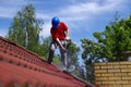 House roof cleaning with pressure tool Royalty Free Stock Photo