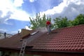 House roof cleaning with pressure tool Royalty Free Stock Photo