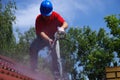 House roof cleaning with pressure tool Royalty Free Stock Photo