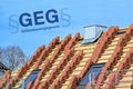 House roof is newly covered for the German Gebaeudeenergiegesetz (GEG), meaning Building Energy Law