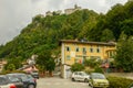 House and Sacred mountain sanctuary on background, Varallo Sesia village, Piedmont, Italy Royalty Free Stock Photo