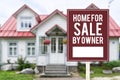 A House For Sale by owner or FSBO sign in front of a large 2 story house. A residence sold directly by the owner and without an Royalty Free Stock Photo
