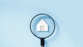 House search. Magnifying glass for looking at house model, house selection, Real Estate House Appraisal And Inspection. Checking Royalty Free Stock Photo