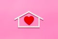 House shape with heart. Love family concept Royalty Free Stock Photo