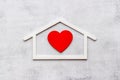 House shape with heart. Love family concept Royalty Free Stock Photo