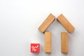 House shape made by wooden block, On the side there are icon rising percentage. Interest rate finance and real estate concept. Royalty Free Stock Photo