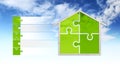 House shape and puzzle symbols, isolated on sky background, infographic for green buildings and save energy eco Royalty Free Stock Photo