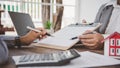 House signers signing signature loan document to home ownership with real estate agents ownership. Mortgage and real estate Royalty Free Stock Photo