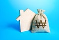 House silhouette and a south korean won money bag. Home purchase, investment in real estate. Mortgage loan. Realtor services.