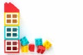 Lego bricks. House of Small and big plastic constructor bricks on white background. Popular toys. Free space for text
