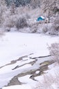 house in snowy forest