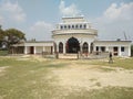 House and soil and grass fields in madhubani India