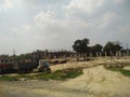 House and soil and grass fields in madhubani India