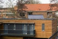 House with solar collectors on the roof.