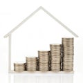 House stacked coins isolated on white background Royalty Free Stock Photo