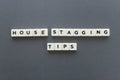 House staging tips word made of square letter word on grey background.