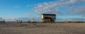 House on stilts at the beach of the German Wadden Sea Royalty Free Stock Photo