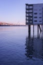 House on stilts in the sea water of Norway