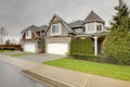 House with stone wall trim and column porch Royalty Free Stock Photo