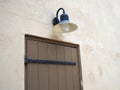 House stone wall with window with classical wooden shutters Royalty Free Stock Photo