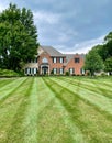 House Surrounded by Green Lawn Royalty Free Stock Photo