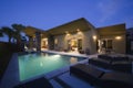 House With Swimming Pool At Night Royalty Free Stock Photo