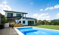 House with swimming pool outdoors in backyard garden. Royalty Free Stock Photo