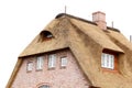 House with a thatched roof on a white background Royalty Free Stock Photo