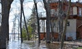 A house is threatened by rising waters levels from the river Royalty Free Stock Photo