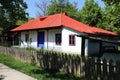 House with tin roof in Dimitrie Gusti National Village Museum in Bucharest Royalty Free Stock Photo