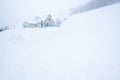 House on the top of the mountain with a lot of snow Royalty Free Stock Photo