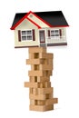 House on tower of wood blocks Royalty Free Stock Photo