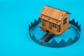 A house in trap. Concept risk in real estate. Royalty Free Stock Photo