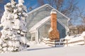 House and tree in winter snow Royalty Free Stock Photo