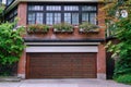 House with two car garage with wood grain door