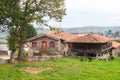 House with a typical granary, horreo, in Tineo. Asturias, Spain Royalty Free Stock Photo