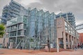 The house of ultra modern architecture, created of glass, stone and metal, with huge windows, a fountain in front of the entrance Royalty Free Stock Photo