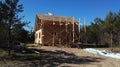 House under construction , around trees, wood , building , wooden house, frame house