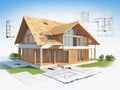 House under construction on blueprints, building project Royalty Free Stock Photo