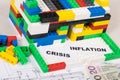 House under construction made of toy blocks, polish currency money, housing plan. Rising costs of building or renovating home Royalty Free Stock Photo