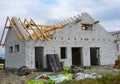House under construction with roofing constraction wooden frame. House construction site Royalty Free Stock Photo