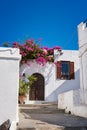 House/villa with flowers on the way to Acropolis of Lindos Rhod Royalty Free Stock Photo