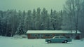 A house, and vintage car are covered with white snow in scandinavia Royalty Free Stock Photo