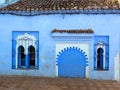 house wall on blue street Chefchaouen Royalty Free Stock Photo