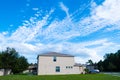 House, white cloud and blue sky Royalty Free Stock Photo