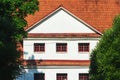 House with White Gable and Red Ceramic Roof Tiles